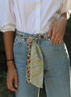 Les Belles Vagabondes silk bandeau worn as a belt with jeans and a white shirt