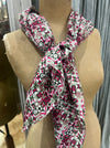 Les Belles Vagabondes Malmo cotton square scarf in rose pink and green, tied on a mannequin