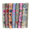 Les Belles Vagabondes mini shippo silk scarves folded in a row, showing all colourways