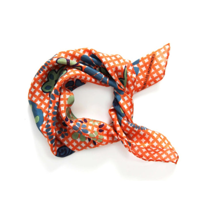Les Belles Vagabondes mini shippo silk neckerchief in orange, tied in a knot