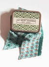 Les Belles Vagabondes Nicky silk bandeau in mint with its reusable gift tin