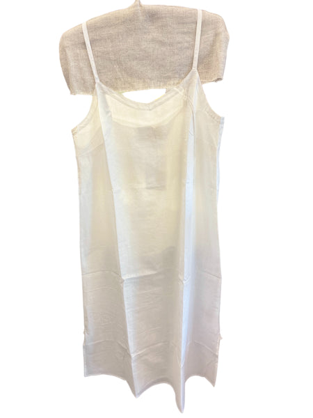 LOOM ivory silk and cotton slip dress on a hanger, full length