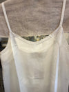 LOOM ivory silk and cotton slip, strap and neckline detail on a mannequin