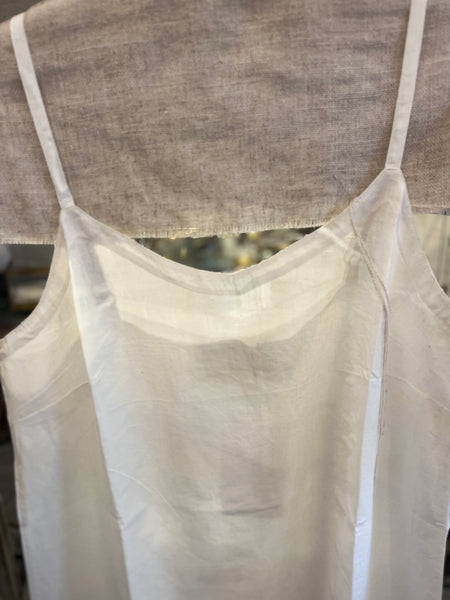 LOOM ivory silk and cotton slip, strap and neckline detail on a mannequin