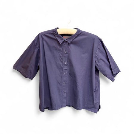 Manuelle Guibal Iyo short sleeve cotton shirt in indigo blue, on hanger