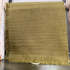 Manuelle Guibal Jowool fringed wool scarf in olive green, hung on a rail