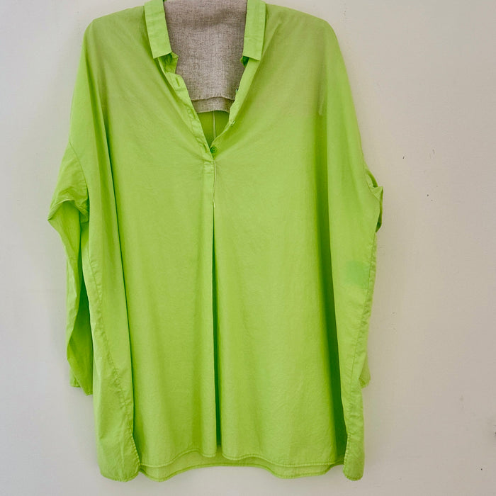 Manuelle Guibal Keya cotton blouse in lime green, front view on hanger