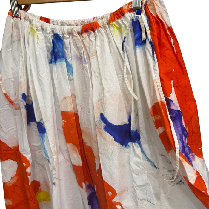 Manuelle Guibal Noni cotton print skirt, white with orange and blue print, close up