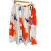 Manuelle Guibal Noni cotton print skirt, white with orange and blue print, on hanger