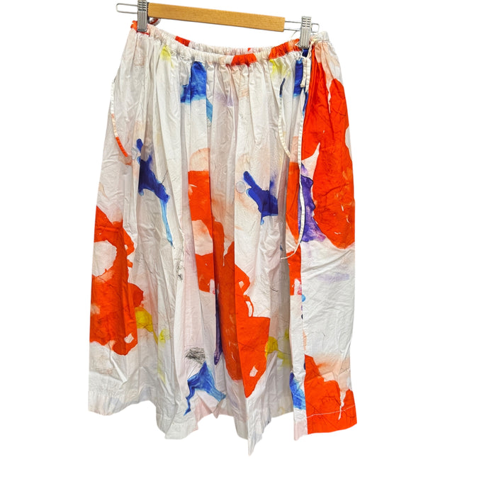 Manuelle Guibal Noni cotton print skirt, white with orange and blue print, on hanger