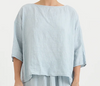 Manuelle Guibal Yilin simple linen tee blouse in ash pale blue, worn front view