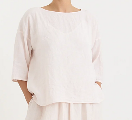 Manuelle Guibal Yilin simple linen tee blouse in pale blush, worn front view