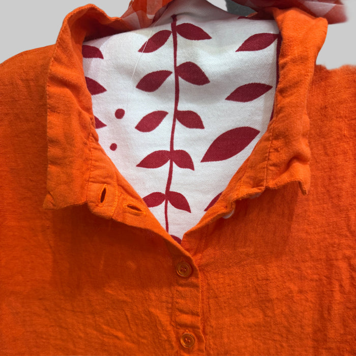 Manuelle Guibal Yilin linen tunic in reddy orange, collar detail