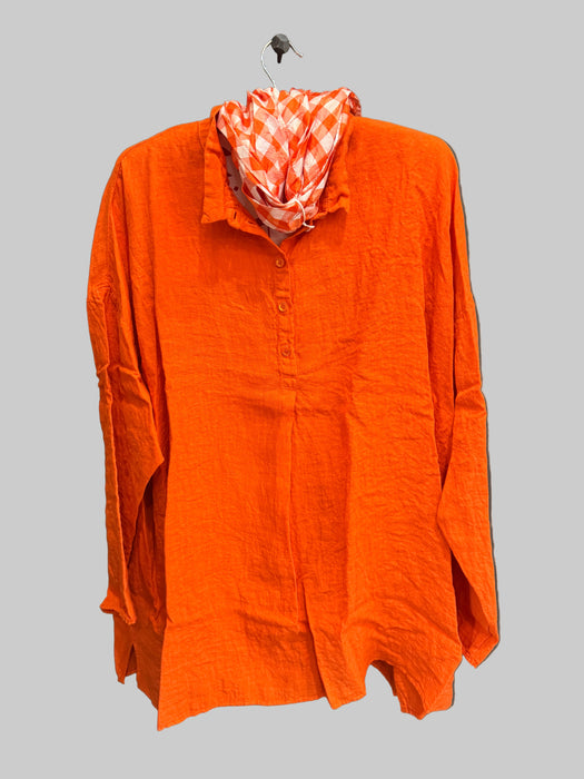 Manuelle Guibal Yilin linen tunic in reddy orange, styled with a check scarf