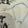 Mary Odorcic grey silk bracelet with gold ball and pearl