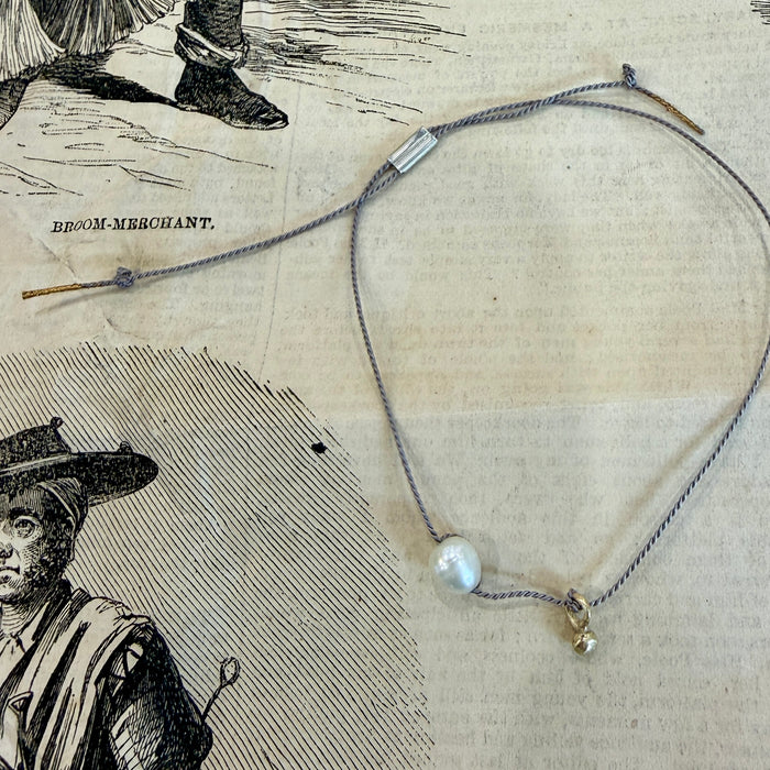 Mary Odorcic grey silk bracelet with gold ball and pearl