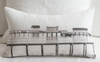 Melissa Stewart oblong linen cushion printed with a black and white pier