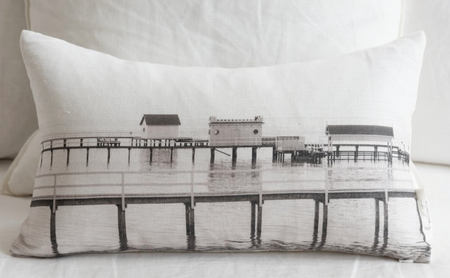 Melissa Stewart oblong linen cushion printed with a black and white pier