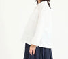 Metta Melbourne Fisherman shirt in white, side view