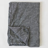Metta Melbourne black houndstooth linen napkin, folded