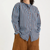 Metta Melbourne Italy shirt in blue and coco stripe, worn with brown pants