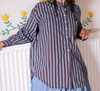 Metta Melbourne Italy shirt in blue and coco stripe, worn indoors