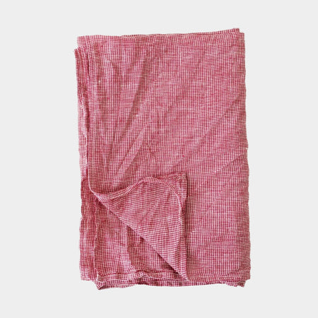 Metta Melbourne red houndstooth linen tea towel, folded