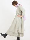 Metta Melbourne Oak dress in concrete, worn side view with boots