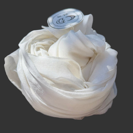 Metta Melbourne soft classic scarf in antique white, rolled