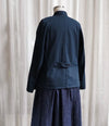 Metta Melbourne Train driver's jacket in navy, back view on a mannequin