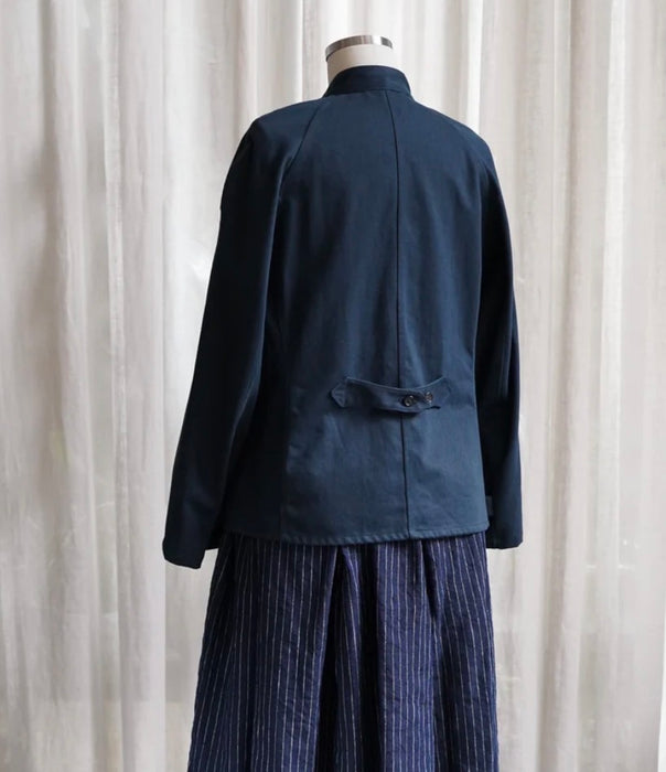 Metta Melbourne Train driver's jacket in navy, back view on a mannequin