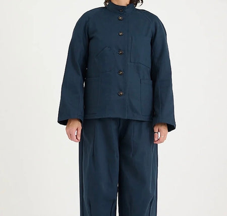 Metta Melbourne Train driver's jacket in navy, worn with matching pants