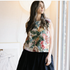 Metta Melbourne Ulla cotton poplin skirt in denim, worn with a floral sleeveless top