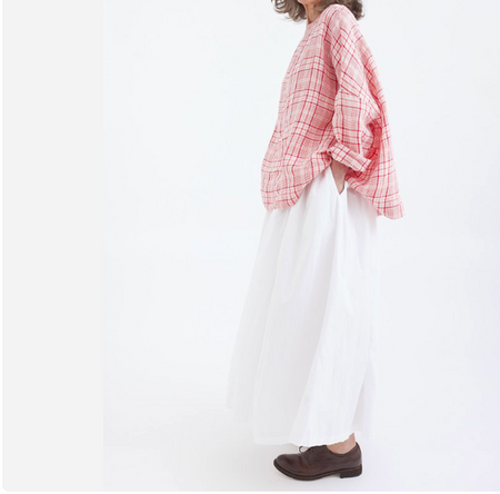 Metta Melbourne Ulla cotton poplin skirt in white, worn with a pink check shirt