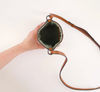 Inside the Nancybird beaded slim pouch bag, held open by hand