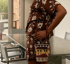 Nancybird beaded slim pouch bag worn crossbody with a brown floral outfit