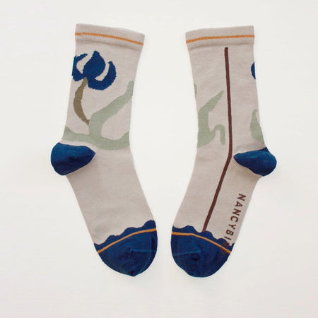Nancybird Blue Flower cotton socks in stone with bold blue floral print and navy heel and toe
