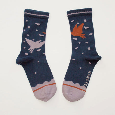 Nancybird cotton socks in navy with flying bird print in pink and orange