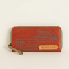 Nancybird long zip leather wallet in murcott orange-red with embossed line design