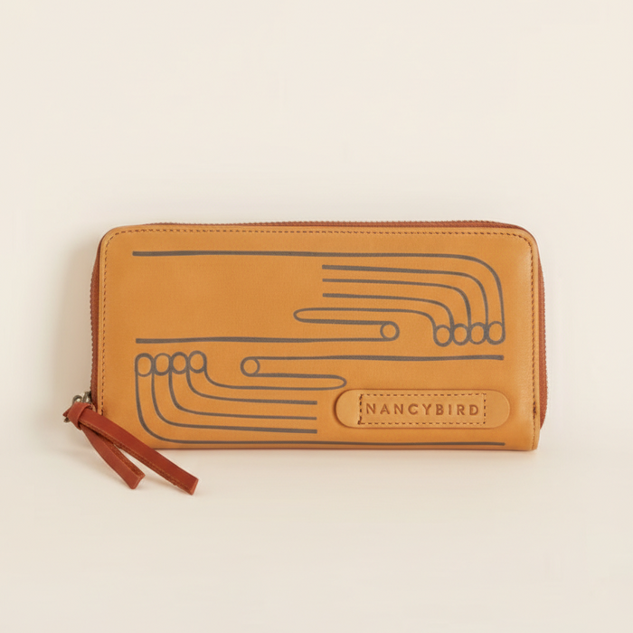 Nancybird long zip leather wallet in ochre with embossed line design