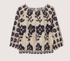Nancybird Maha shirred blouse in cream with black floral print, flat lay