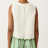 Back view of the Nancybird Moa white sleeveless tank top with scalloped hem