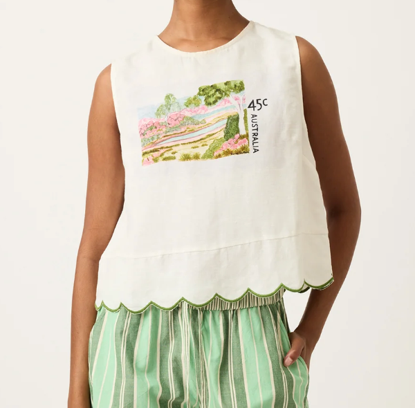 Nancybird Moa white sleeveless top with stamp print, worn with green striped pants