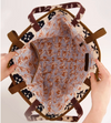 Inside a Nancybird floral tote bag showing the printed lining