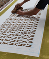 Nancybird geo flower tablecloth being hand block printed