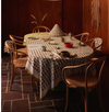 Nancybird geo flower print tablecloth on a round dining table