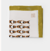 Nancybird tablecloth in geo flower print, folded with olive border