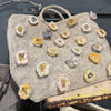 Sophie Digard natural raffia tote bag with appliqued wool flowers in pastel tones