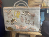 Back of the Sophie Digard pale grey woollen tote with different appliqued animals