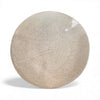Round stone plate on a white background